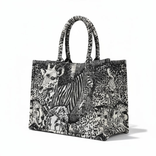 Handmade fabric tote bag with a luxury black and white safari animals design.