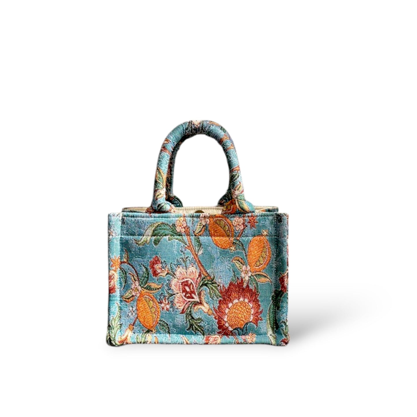 Front view of a lightweight mini book tote in vintage blue floral print.