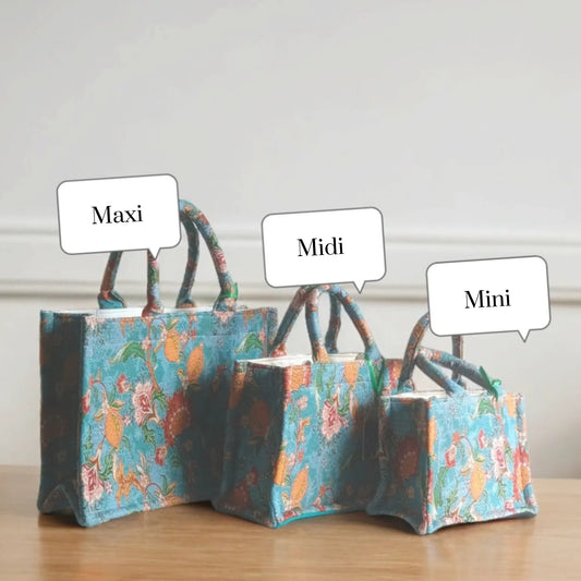 Three vintage blue floral tote bags of different sizes, lined up to show the Maxi, Midi, and Mini options.