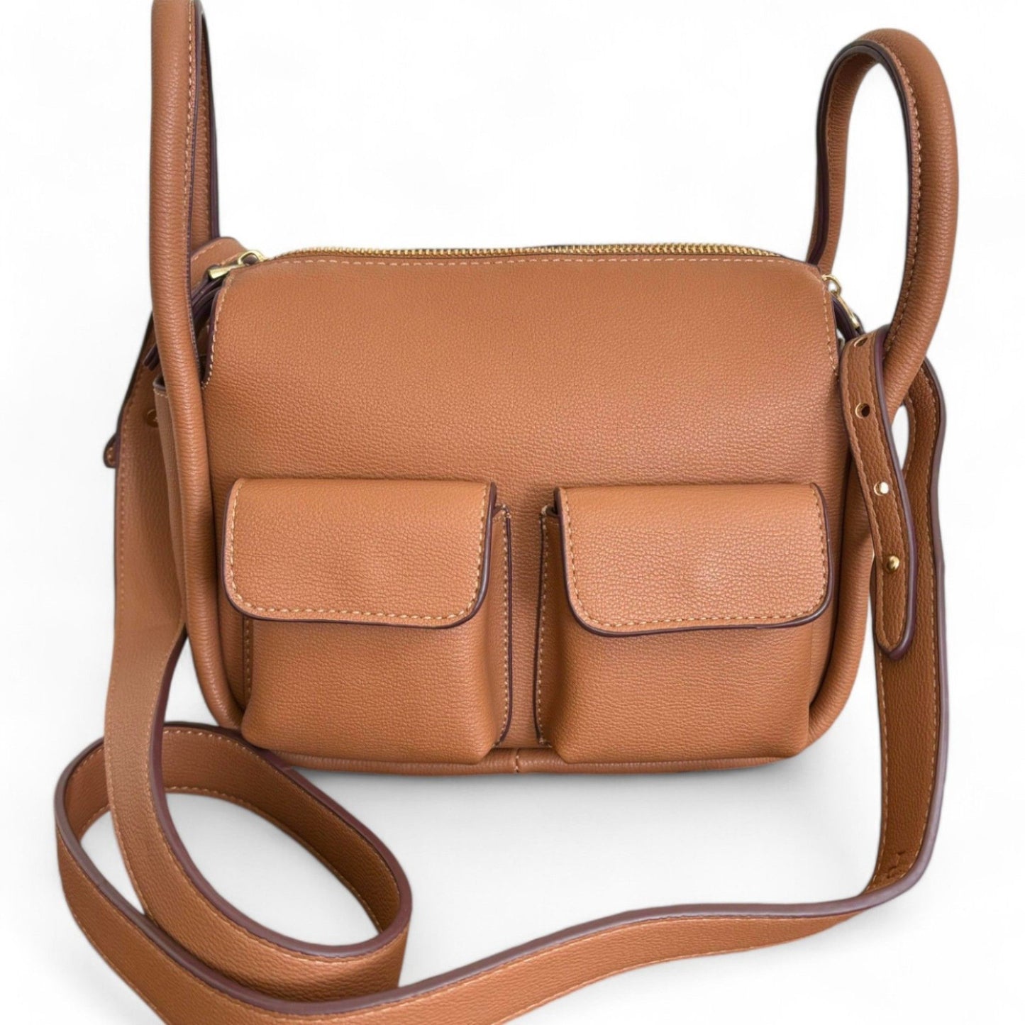 Front close-up of brown faux leather Dougie bag with two front pockets, an adjustable and detachable long shoulder strap.
