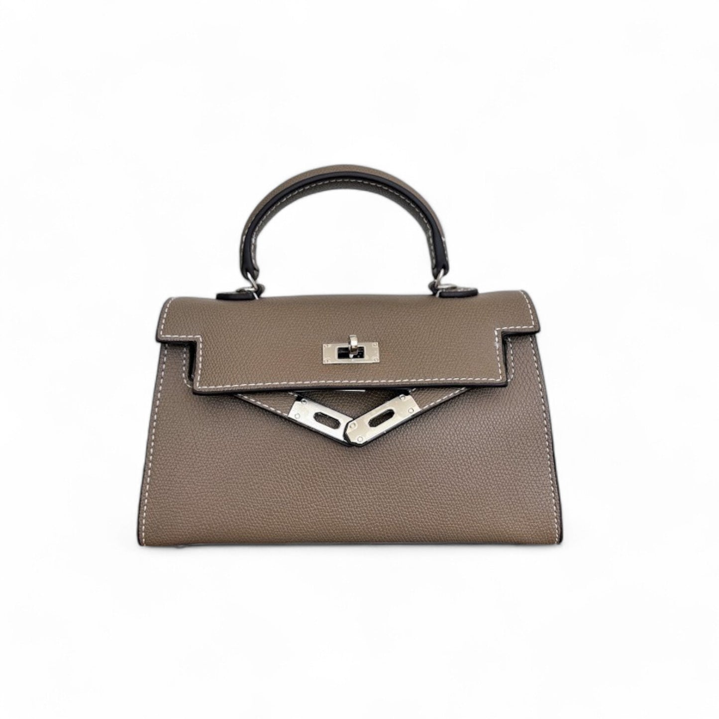 Front view of taupe mini top-handle bag with silver hardware & structured flap closure.
