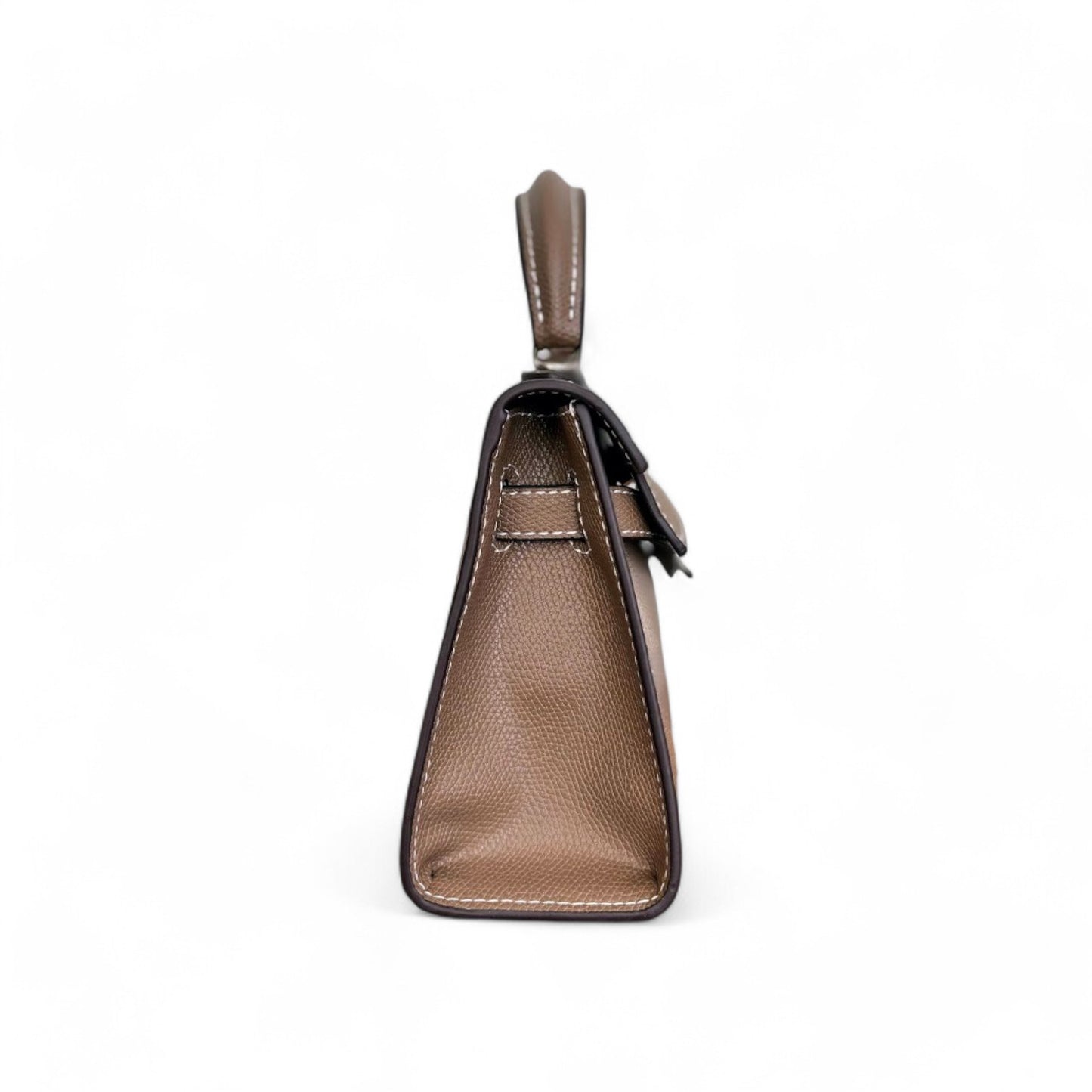 Side view of taupe mini top-handle bag with contrast stitching and structured base.