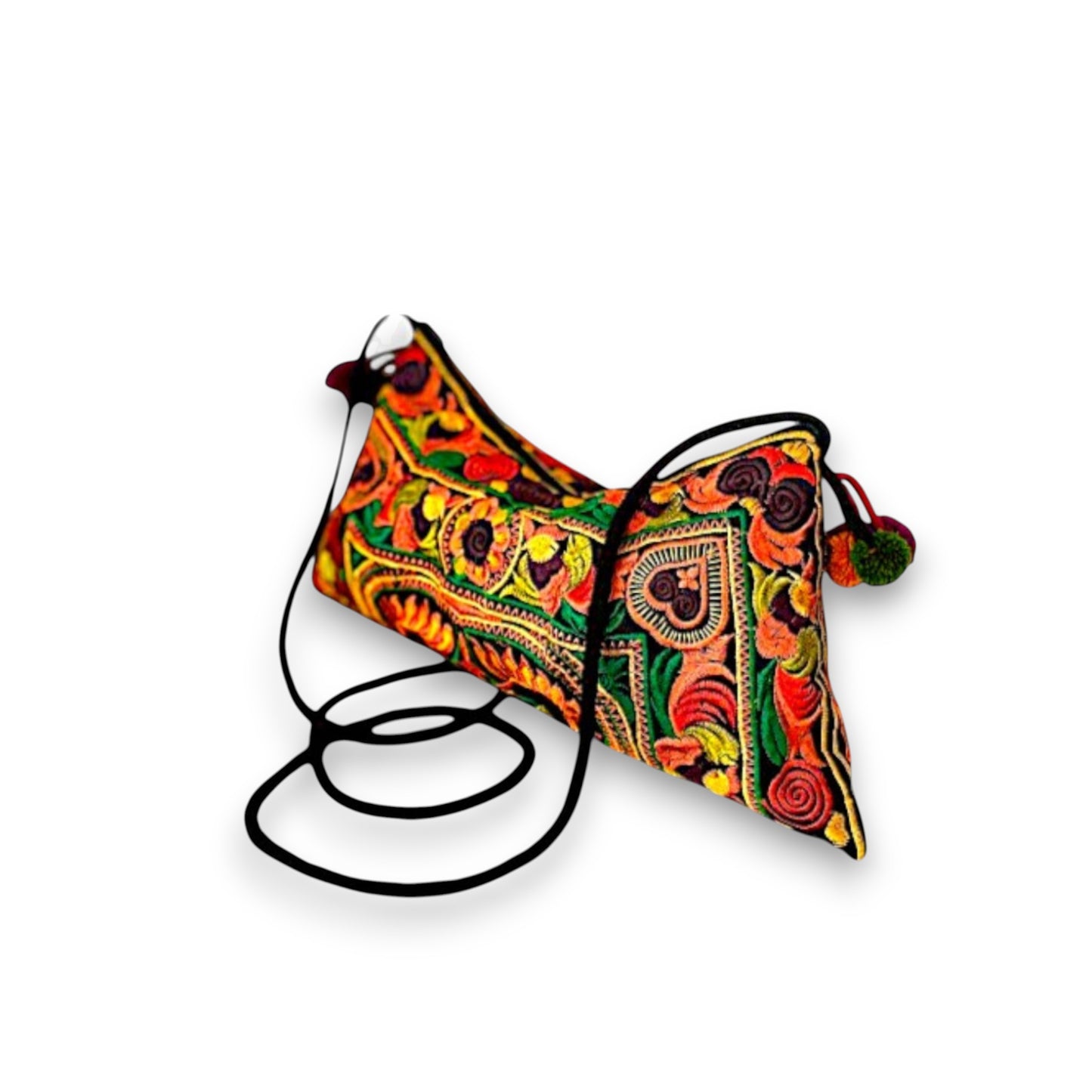 Angle view of a vibrant orange Hmong crossbody bag with colourful mini pom-pom charms and a strap.