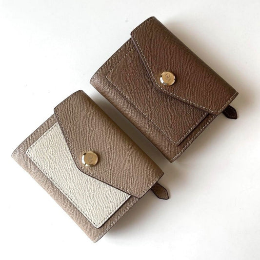 Khaki and Beige-Cream wallets, envelop-style flap, and smooth gold button, shown side by side.