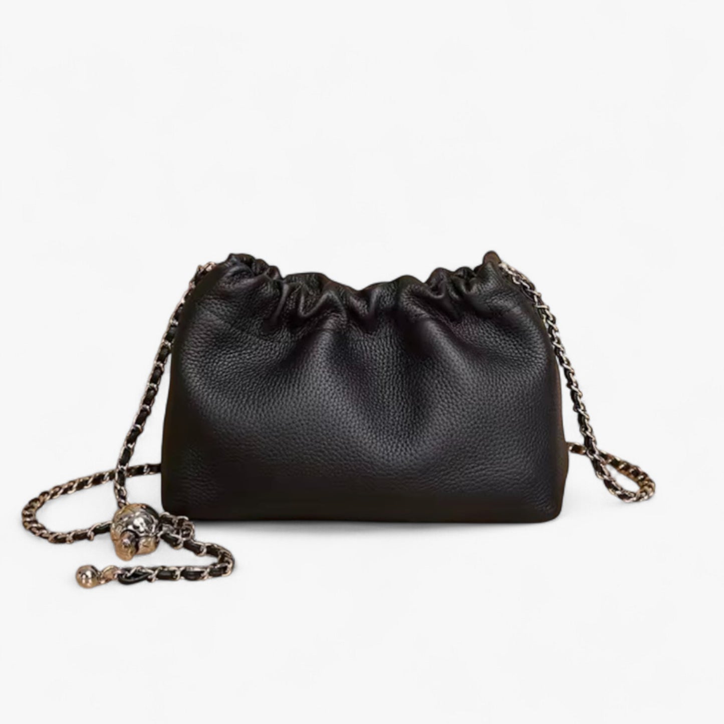 Black leather handbag with top ruched detail and a silver chain strap.