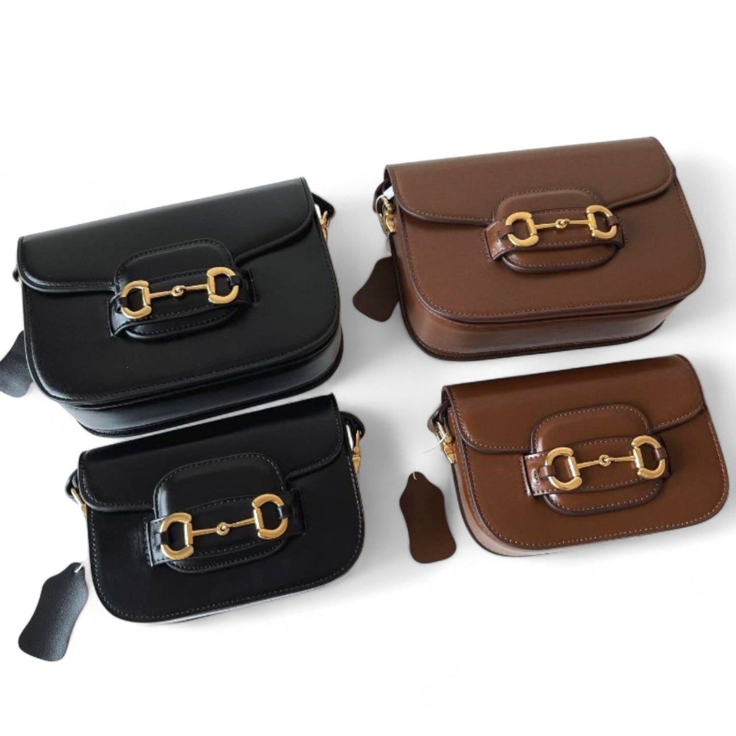 4 handbags in black and brown with gold accents: 2 in medium size and 2 in small size.