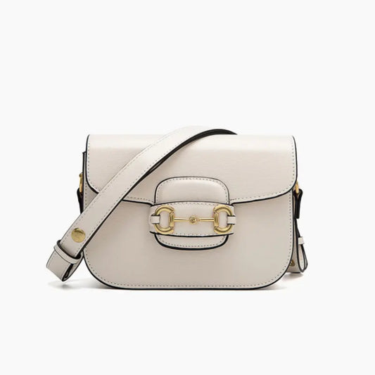 A white leather handbag with gold accents, with a front flap closure and a strap that goes across.