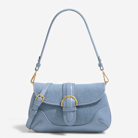 Stylish blue denim shoulder bag with a gold buckle, perfect for everyday fashion.