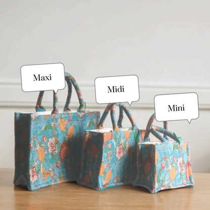 Three vintage blue floral tote bags of different sizes, lined up to show the Maxi, Midi, and Mini options.