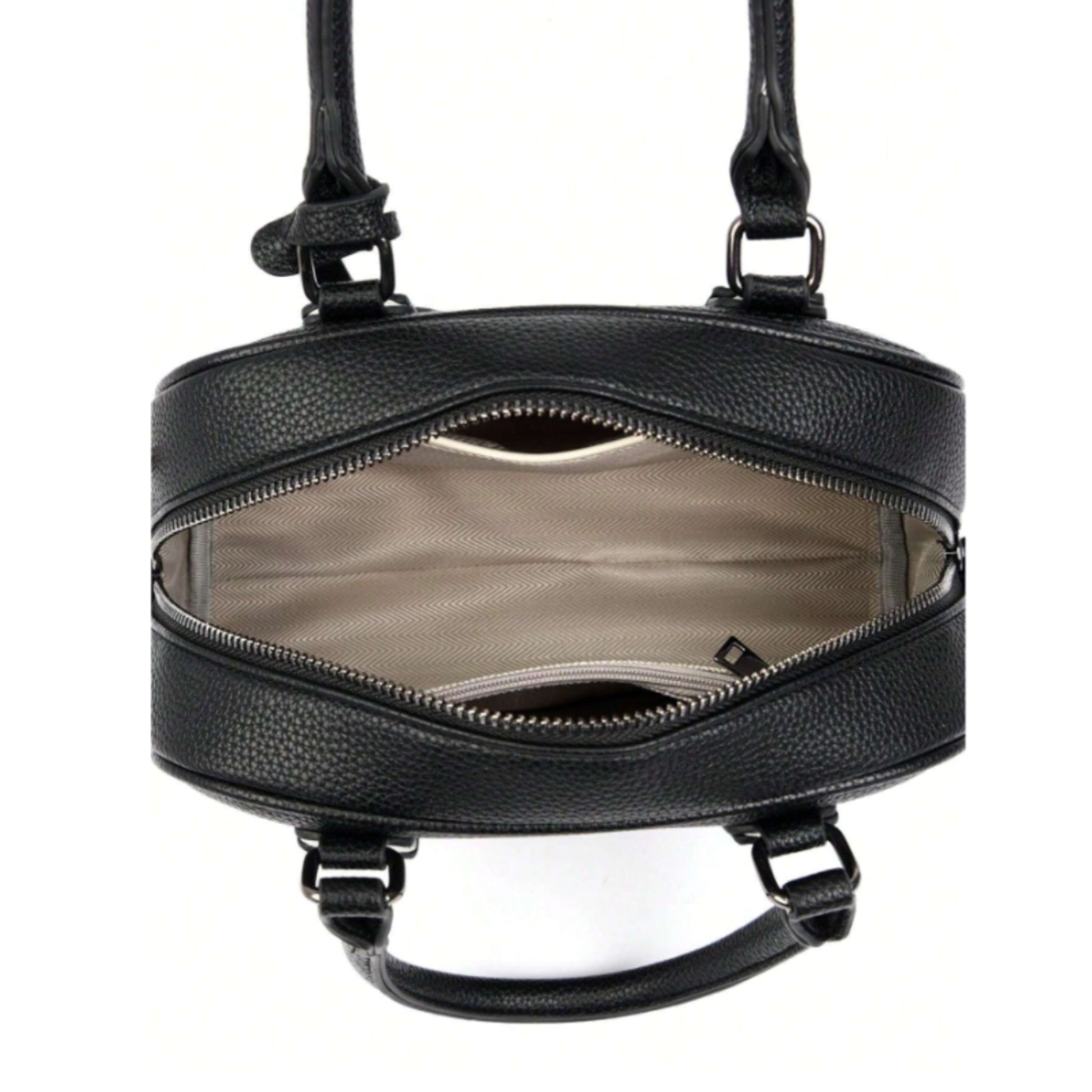 Interior of Celeste, a PU leather bowling bag showing 1 slip and 1 zip pocket, with beige fabric lining.
