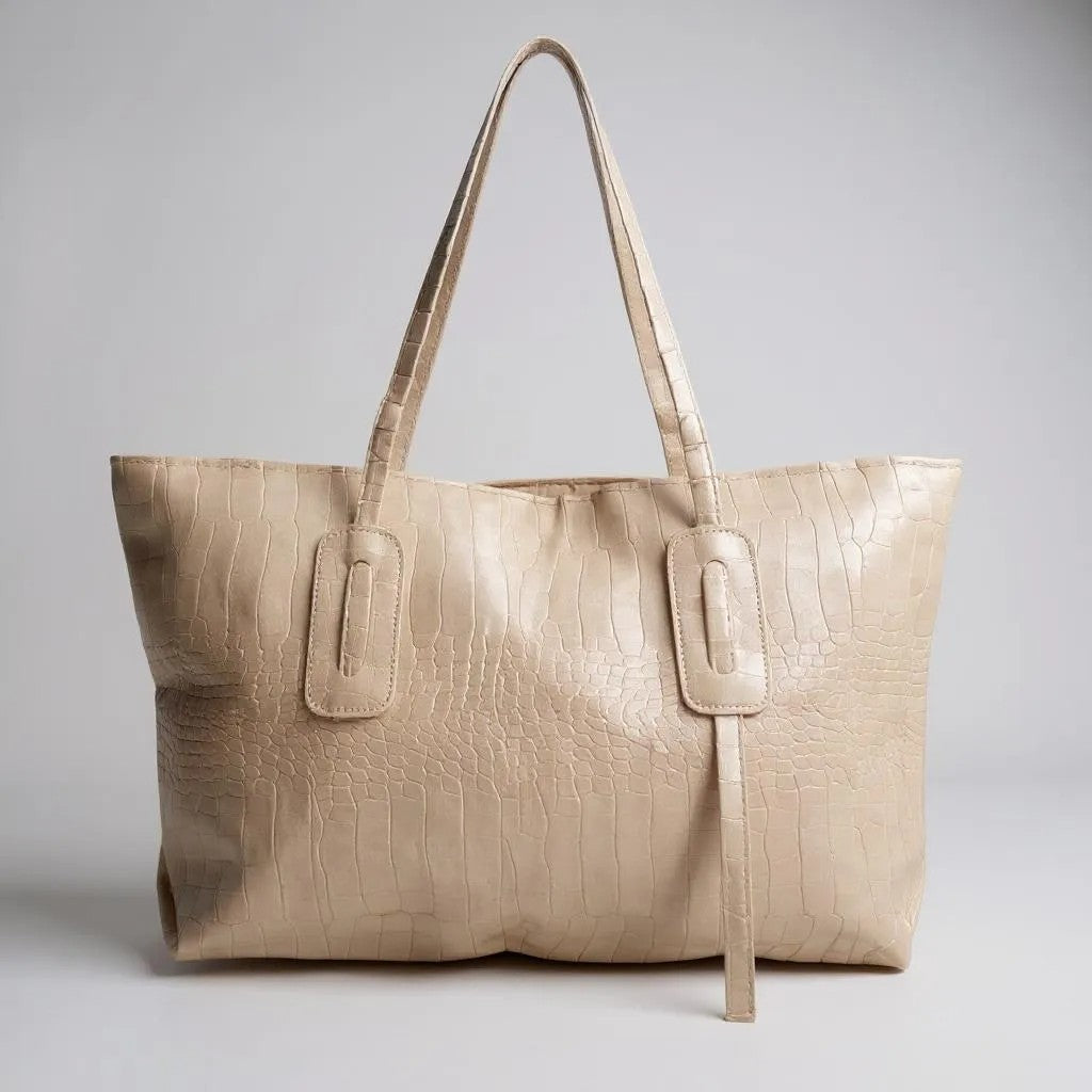 An off-white croc-effect vegan leather large shopper tote, elegant and spacious bag.