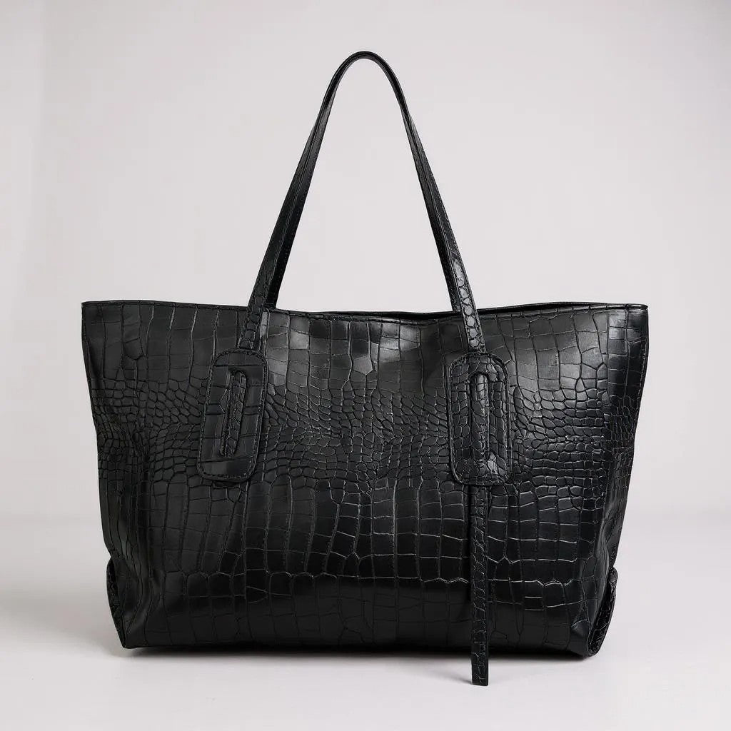 A classic black croc-embossed spacious tote bag, durable and chic vegan leather purse.