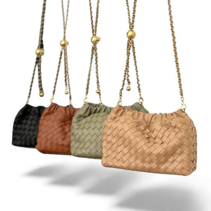 A row of woven pattern bags in black, brown, sage, and tan, featuring ruched tops and gold chain strap.