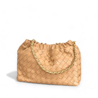 Tan woven pattern bags with ruched tops and gold chain strap on white background.