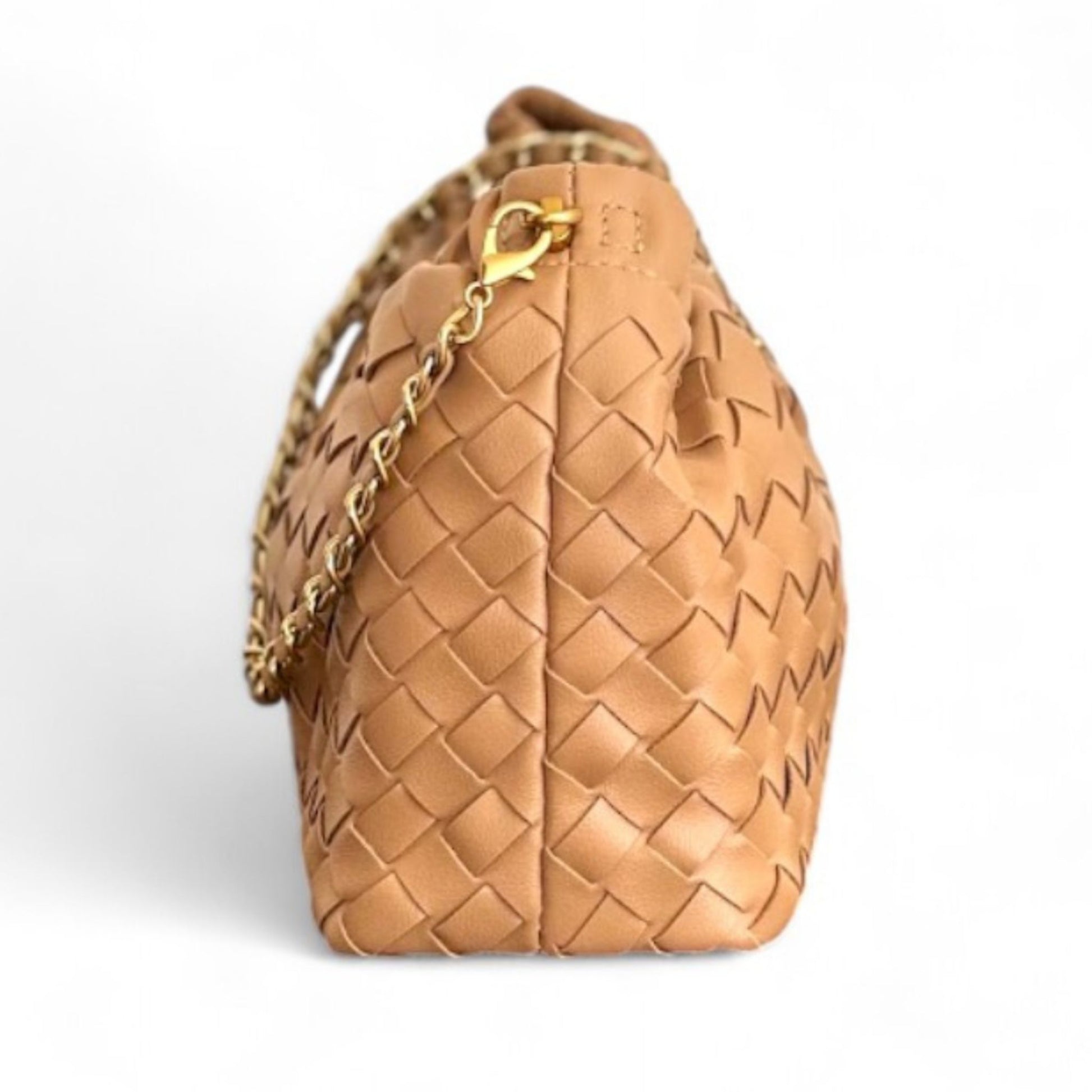 Side view of tan woven pattern bags with gold chain strap on white background.