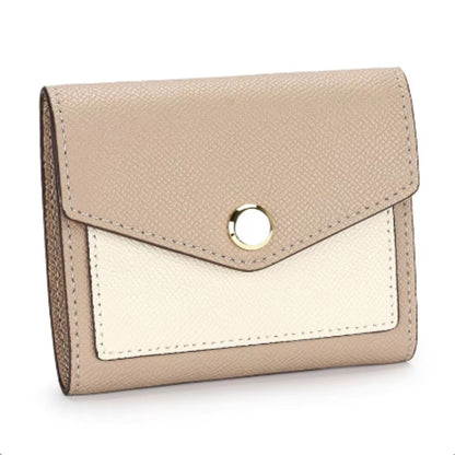Wallet in beige/cream with grain-textured leather, featuring an envelope flap and a smooth gold button.