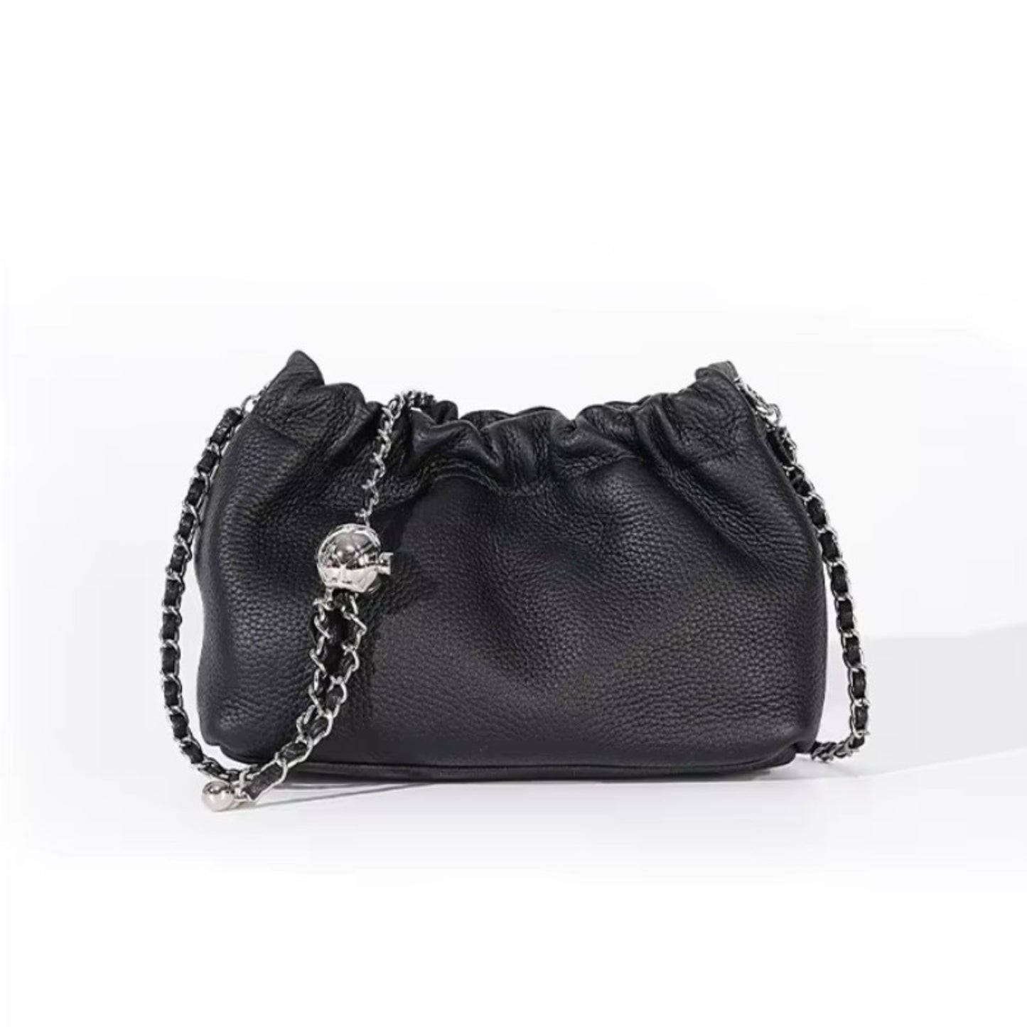 Black pebbled leather handbag with a silver chain strap.