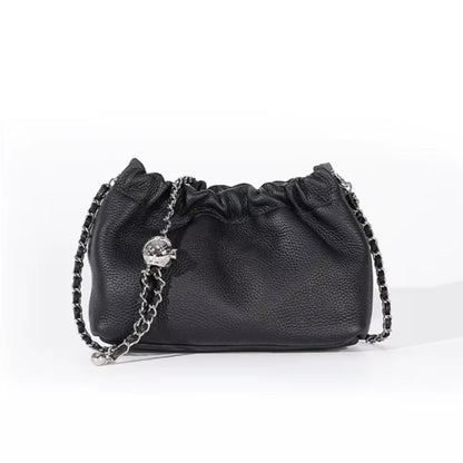 Black pebbled leather handbag with a silver chain strap.