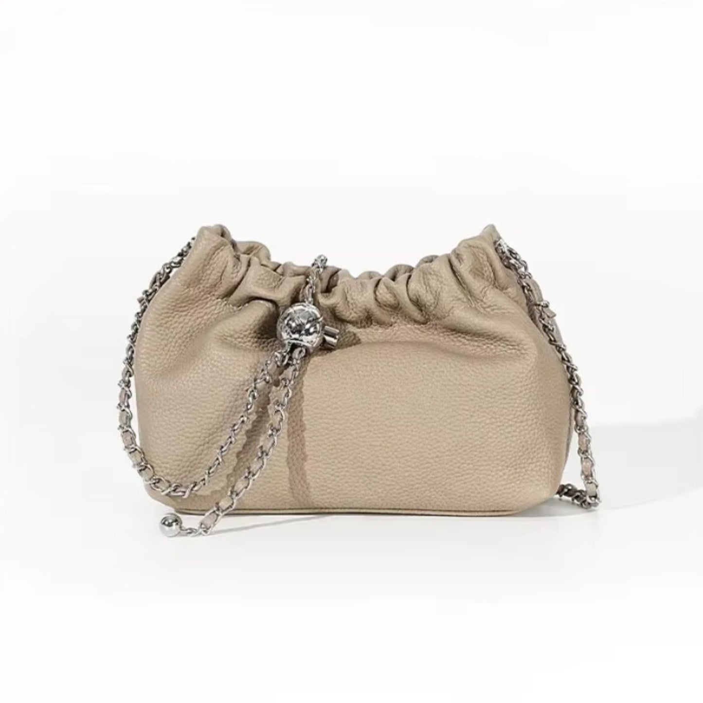 Beige pebbled leather handbag with a silver chain strap.