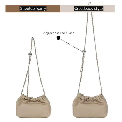 Beige handbag shown in shoulder and crossbody styles with an adjustable bail clasp.
