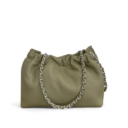 A green leather handbag with a top ruched detail and a silver chain strap.
