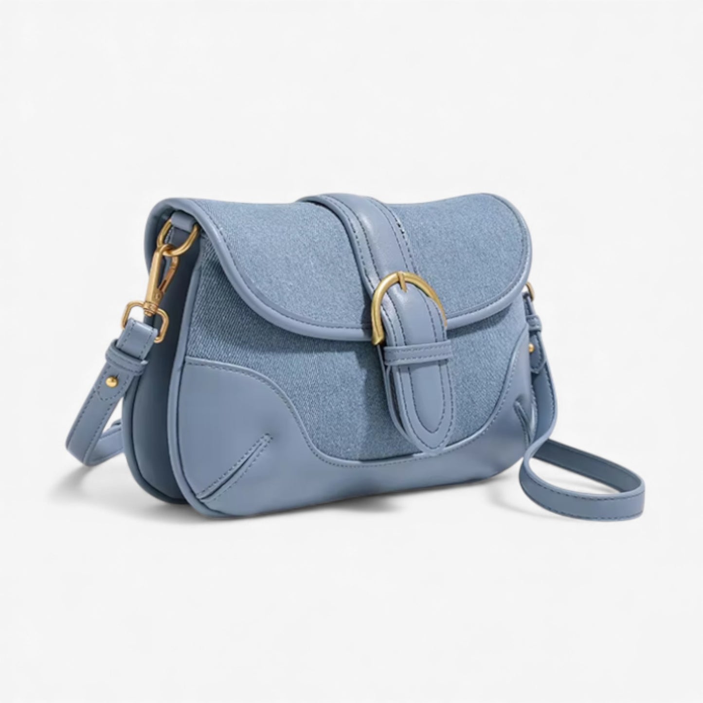 Stylish blue denim shoulder bag with gold accents. A fantastic choice for adding style to your everyday look.