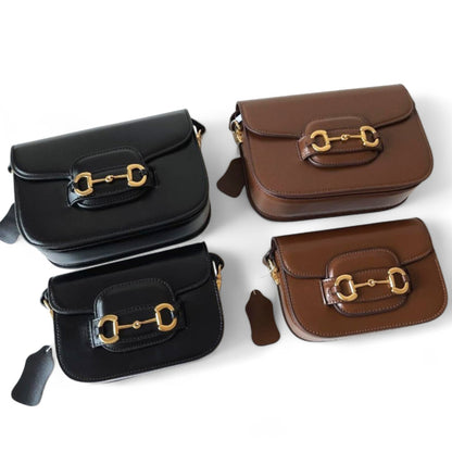 4 handbags in black and brown with gold accents: 2 in medium size and 2 in small size.