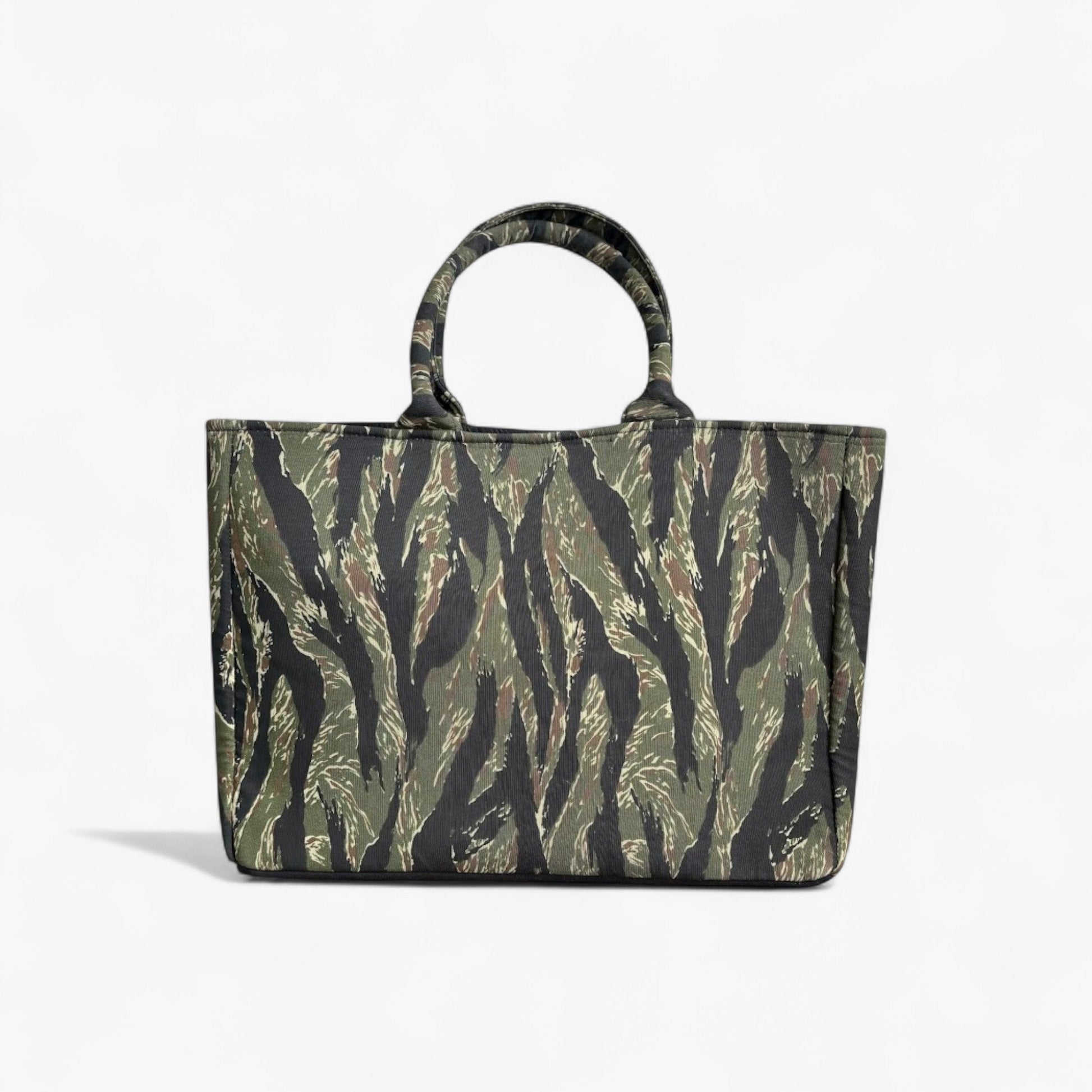 A shopper tote bag with a stylish jungle green and black camouflage pattern.